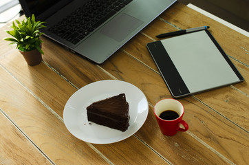 Coffee time with hot drink and chocolate cake for graphic design life style technology concept