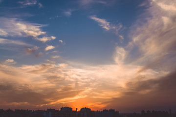  Beautiful sunset. Sunset over the city. Skyscrapers. Multicolored sky. Clouds.