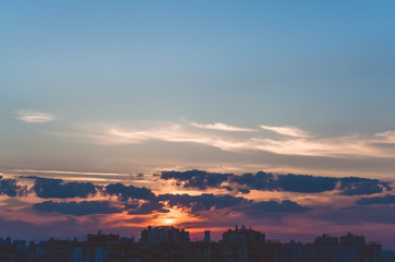  Beautiful sunset. Sunset over the city. Skyscrapers. Multicolored sky. Clouds.