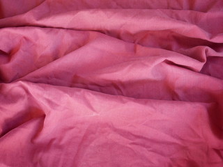 background of red silk fabric