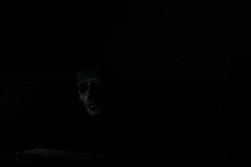 Black mask in the dark ritual and mystery