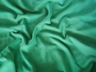 Green silk fabric background