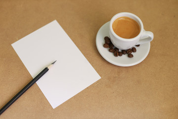 coffee and note paper on wooden background
