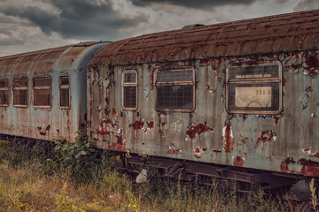 Fototapeta na wymiar abandoned train passenger cars