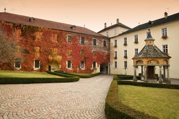 The ancient well of wonders at Abbey of Novacella, south tyrol, Bressanone, Italy. The Monastery of Neustift was founded by Bishop of Brixen, the Blessed Hartmann in 1142.