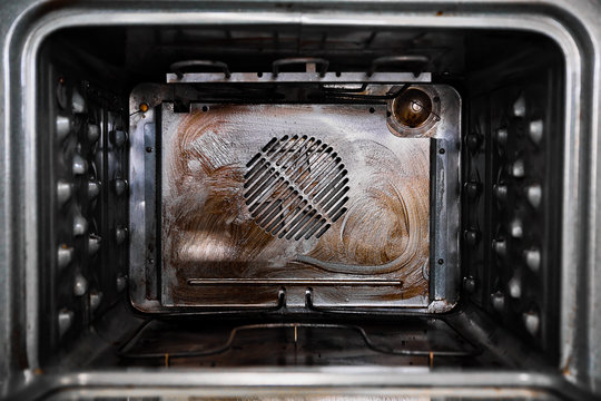 Grease and grime in the interior of a modern convection oven