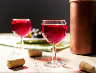 Glasses of rose wine near the cold bucket