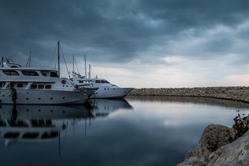 Fototapeta premium Yachts staying at the bay in the morning