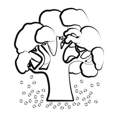 Silhouette of a tree in autumn that are falling leaves.