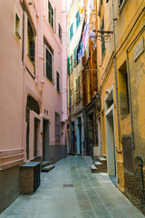Fototapeta na wymiar Traditional street in a summer day in Vernazza, Italy.