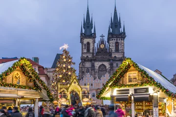 Fotobehang Praag Prague Christmas market on the night in Old Town Square with blurred people on the move. Prague, Czech Republic.