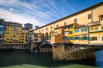 Fototapeta na wymiar Medieval bridge Ponte Vecchio (Old Bridge) and the Arno River in Florence, Tuscany, Italy.