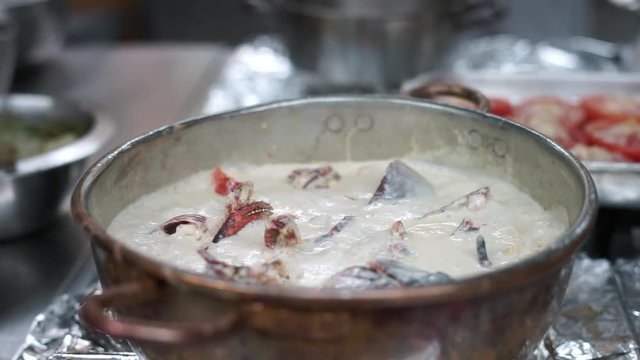 Lobster boiled in milk and wine sauce in the restaurant