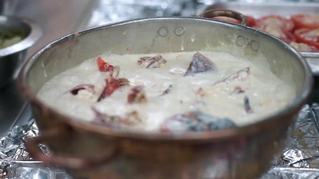 Lobster boiled in milk and wine sauce in the restaurant