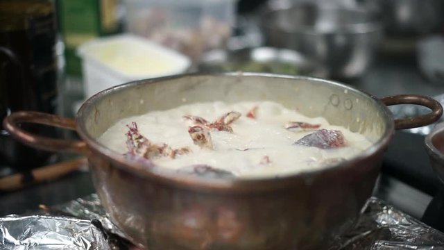 Lobster boiled in milk and wine sauce in the restaurant