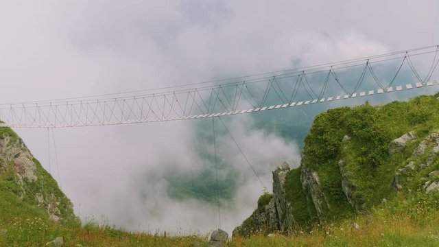 View of empty hanging bridge on viewing place Rosa pik. Bottom view