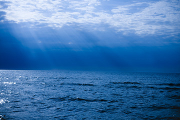 sea ​​with streaks of the sun