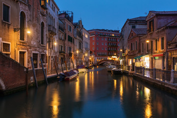 Venetian water сanal at night in Venice, Italy.