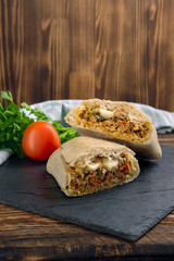 Spicy ciabatta stuffed with fried beef mince, chilli, mozzarella, tomato, bell pepper