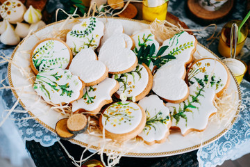 Tasty gingerbread cookies covered with white icing