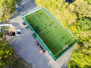Aerial view of the football field. On the football field is played by the courtyard team.