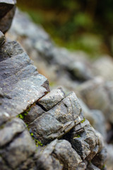 Textured boulders with sky backgrounds