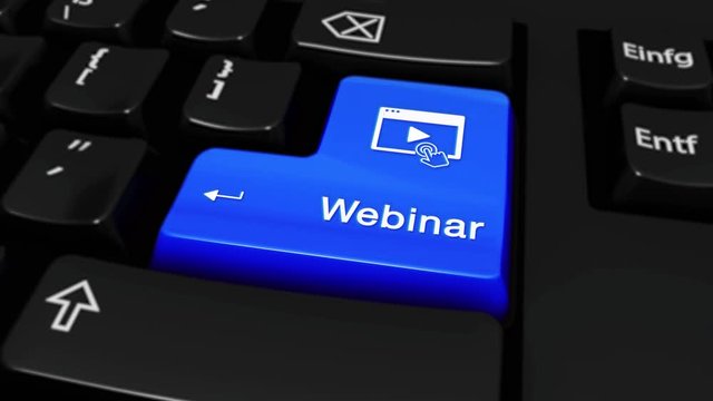 273. Webinar Round Motion On Blue Enter Button On Modern Computer Keyboard with Text and icon Labeled. Selected Focus Key is Pressing Animation. Website Concept