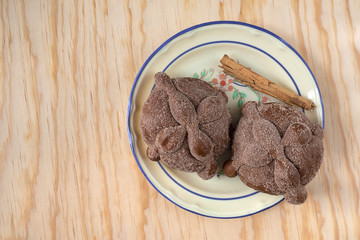 Pan de Muerto, Bread of Dead traditional Mexican sugar scone and dish, baked on day of the dead festivities.