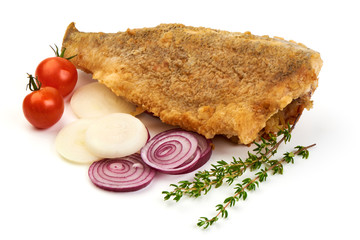 Hot fried fish with vegetables, isolated on white background.