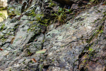 Textured boulders with sky backgrounds