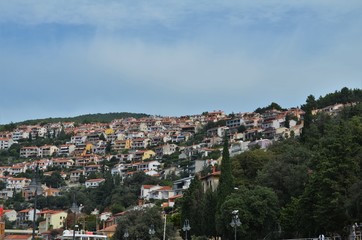 Fototapeta na wymiar houses on a green hill in Rabac in Croatia