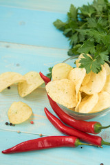 Potato chips with spicy in a glass bowl