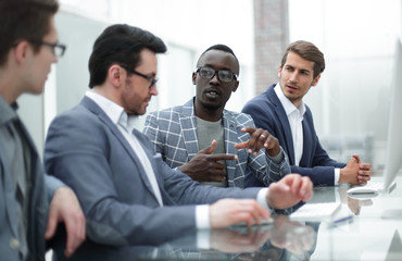 businessman and his business team sitting in the computer room