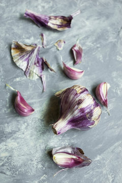 Close-up of purple garlic on table