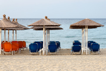 Beach chairs and umbrellas on Neoi Poroi beach