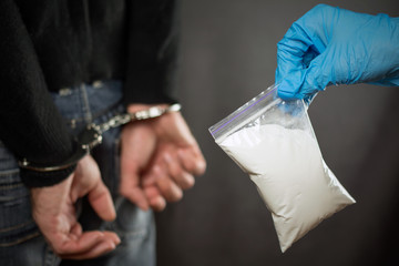 illegal transport of drugs.  A police officer finds drugs during the search of drug dealers.