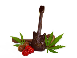 Symbols of rock and roll music. Sex, drugs, Rock n Roll isolated. Fun concept with Chili Willy pepper, chocolate and cannabis leaf on white background