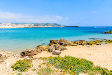 Fototapeta na wymiar View of Tarifa beach from sand dune with flowers, Costa de la Luz, Spain