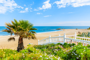 Steps to beautiful beach in small coastal village near Marbella on Costa de Sol, Spain © pkazmierczak