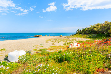 Fishing boat on beautiful beach in small coastal village near Marbella on Costa de Sol, Spain © pkazmierczak