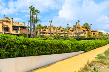 Fototapeta premium Holiday apartments on sea coast near Estepona town, Costa del Sol, Spain