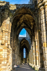 Whitby Abbey North Yorkshire Coast UK. Perched high on a cliff, the haunting remains of Whitby Abbey were inspiration for Bram Stoker's gothic tale of 'Dracula'. 