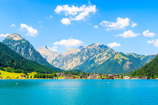 View of Pertisau village on shore of beautiful Achensee lake on sunny summer day, Tirol