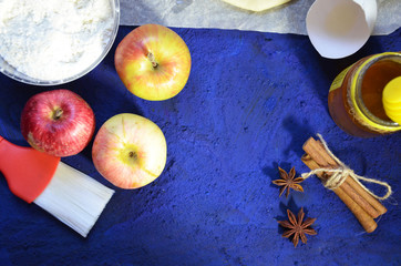 Pastry round, rolling pin and pie pan. Making Apple Pie Tart Series. cinnamon, honey, anise