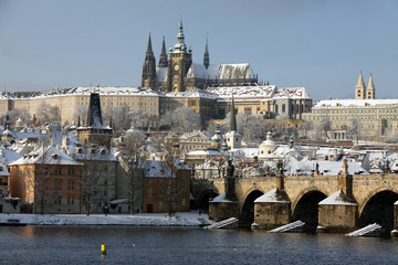 Christmas Snowy Prague City with gothic Castle, Czech republic