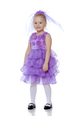 Little girl in purple dress.