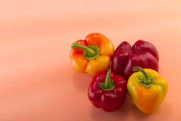 Sweet bellpepper on a colored background. Studio light. Top view