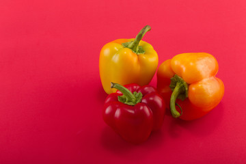 Sweet bellpepper on a colored background. Studio light. Top view