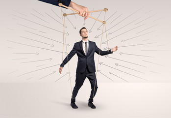 Marionette businessman with doodle lines and arrows around him
