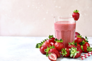 Strawberry banana smoothie in a tall glass.